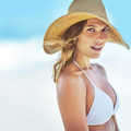 Icon staying safe from the summer sun with a gorgeous sunhat 507183932 1009x1044