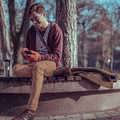 Icon urban young boy chatting in the park 636665604 1247x845